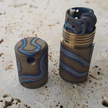 titanium lighters and fire pistons