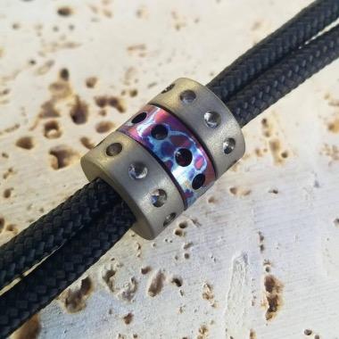 Titanium lanyard beads