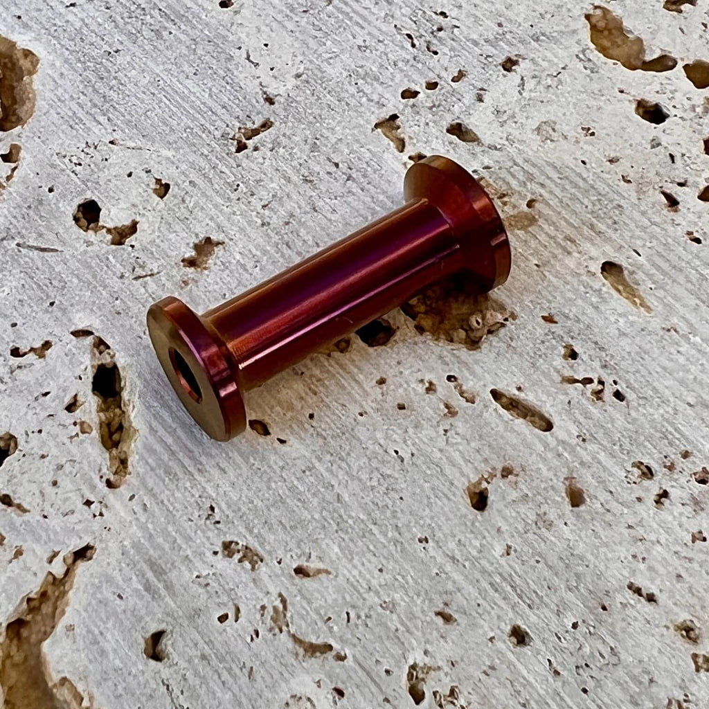 titanium thread bobbin spool with purple anodizing