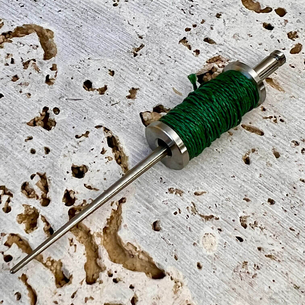 titanium thread bobbin spool with spectra line and matching toothpick