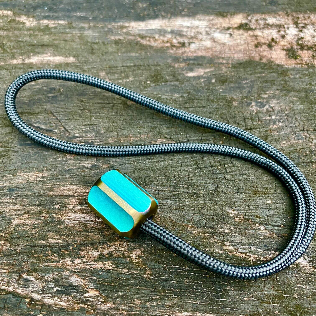 titanium slip bead with green copper anodizing