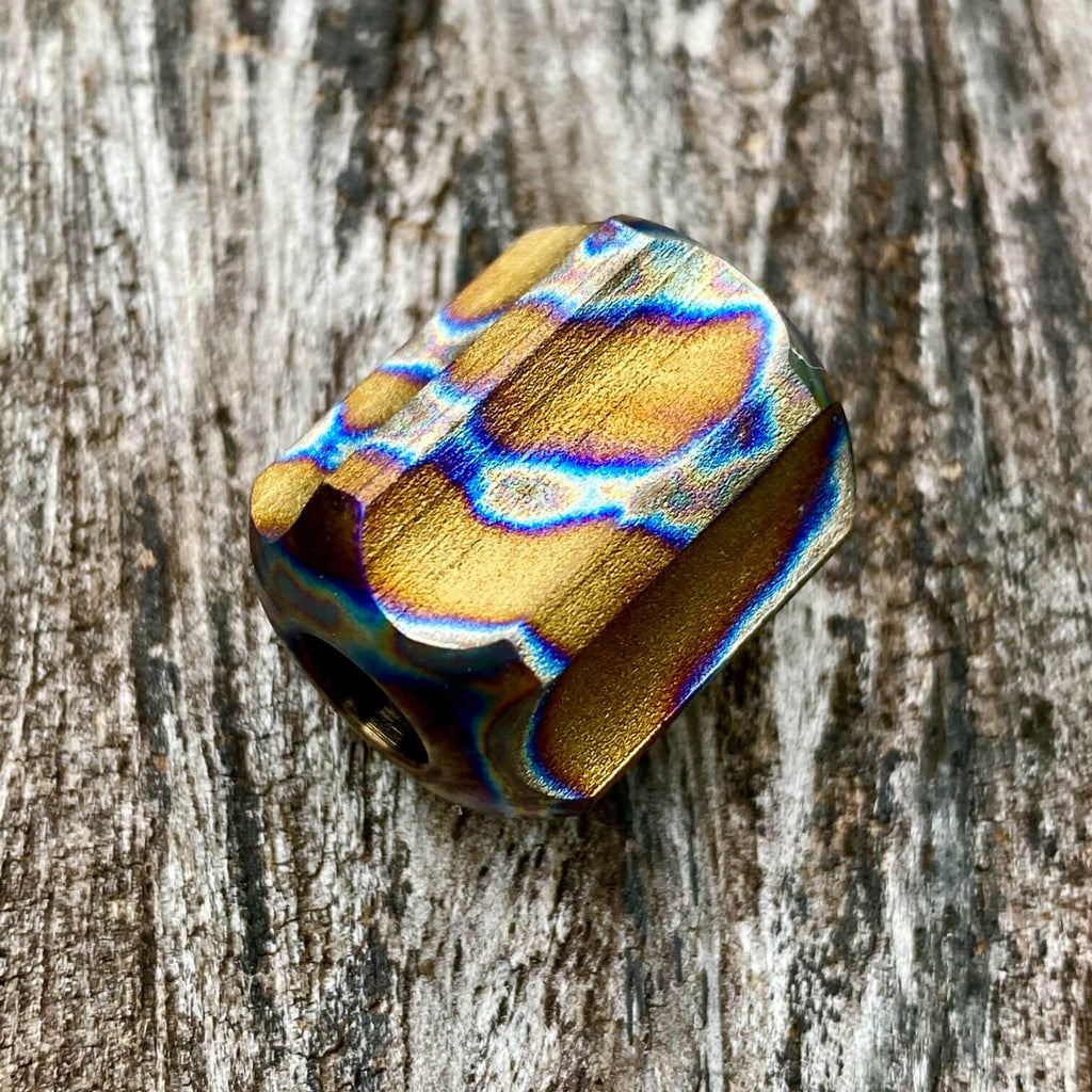 titanium slip bead with polished random anodizing