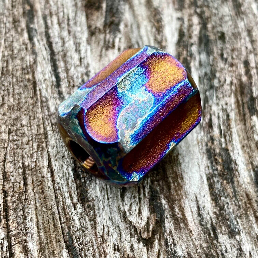 titanium slip bead with blue smoke anodizing