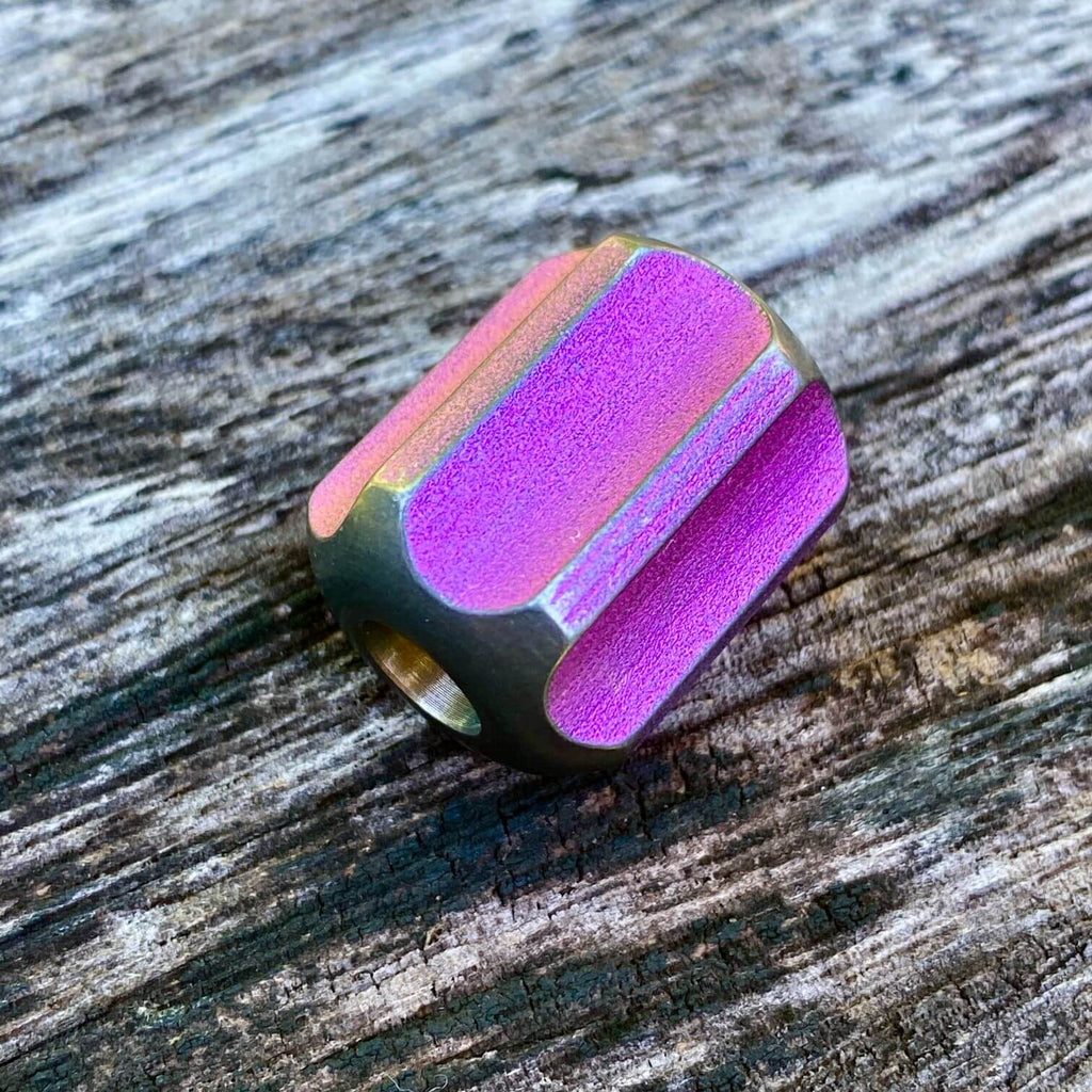 titanium slip bead with stonewashed magenta anodizing