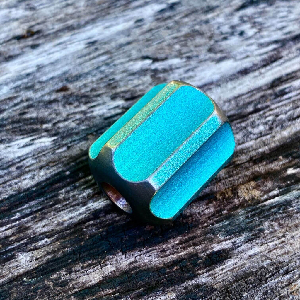 titanium slip bead with stonewashed green anodizing